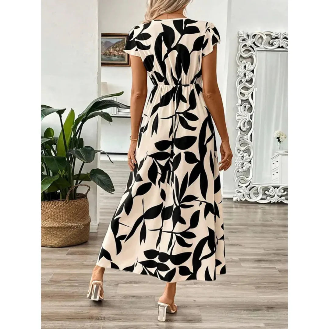 Odessa – Elegante vestido largo con estampado de follaje