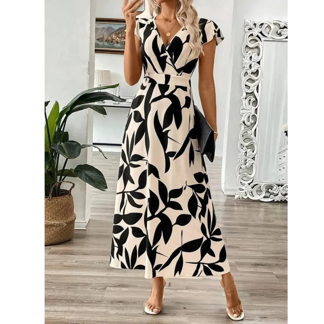 Odessa – Elegante vestido largo con estampado de follaje